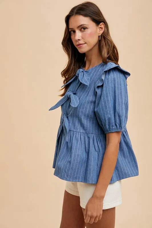 Annie Wear Stripe Front Bow Denim Peplum Blouse by Trendsi