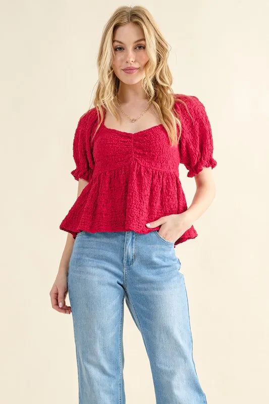 And The Why Lovely Textured and Smocked Top in Red