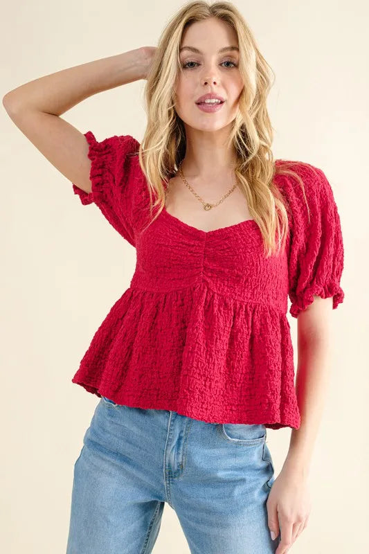 And The Why Lovely Textured and Smocked Top in Red