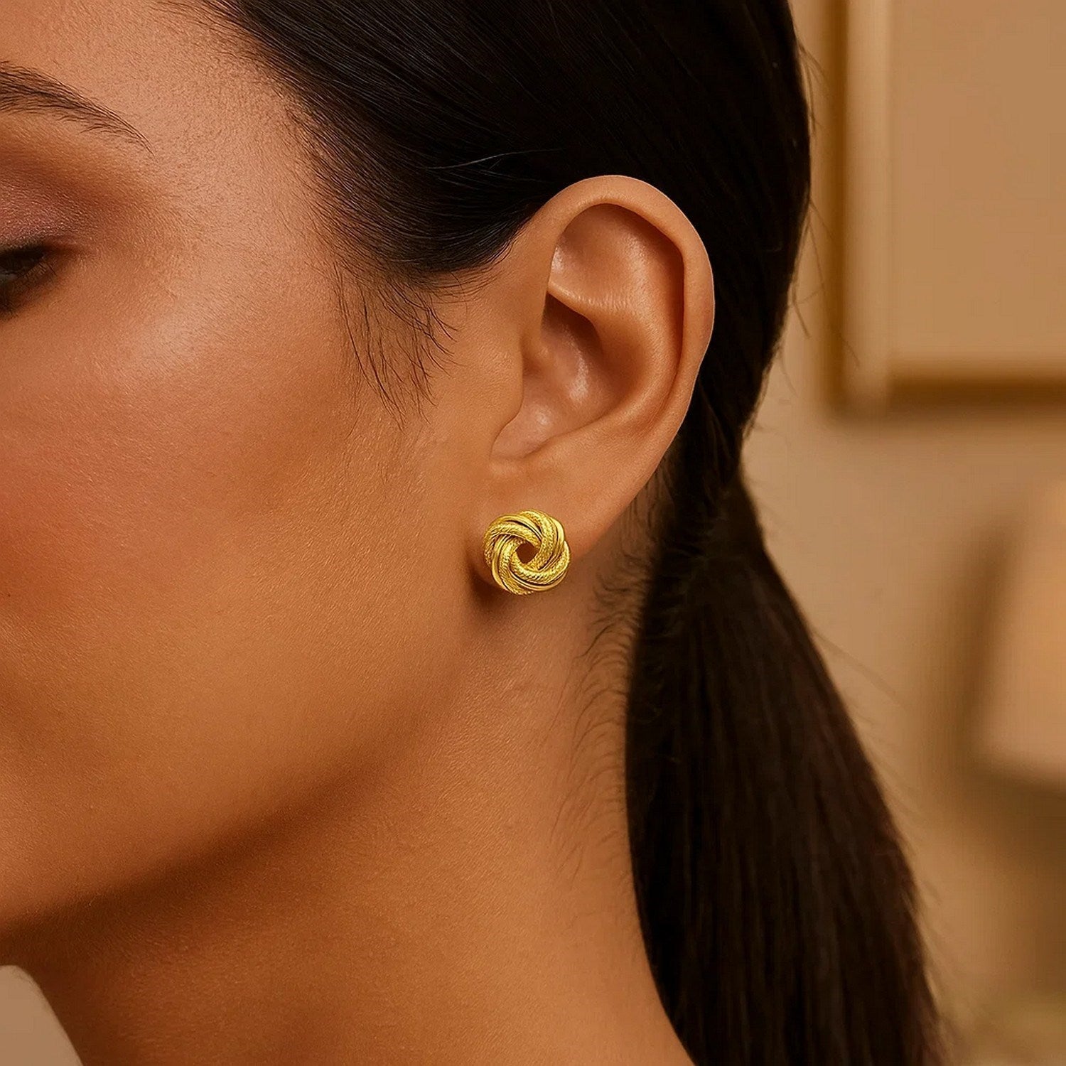 14k Yellow Gold Intertwined Love Knot Stud Earrings