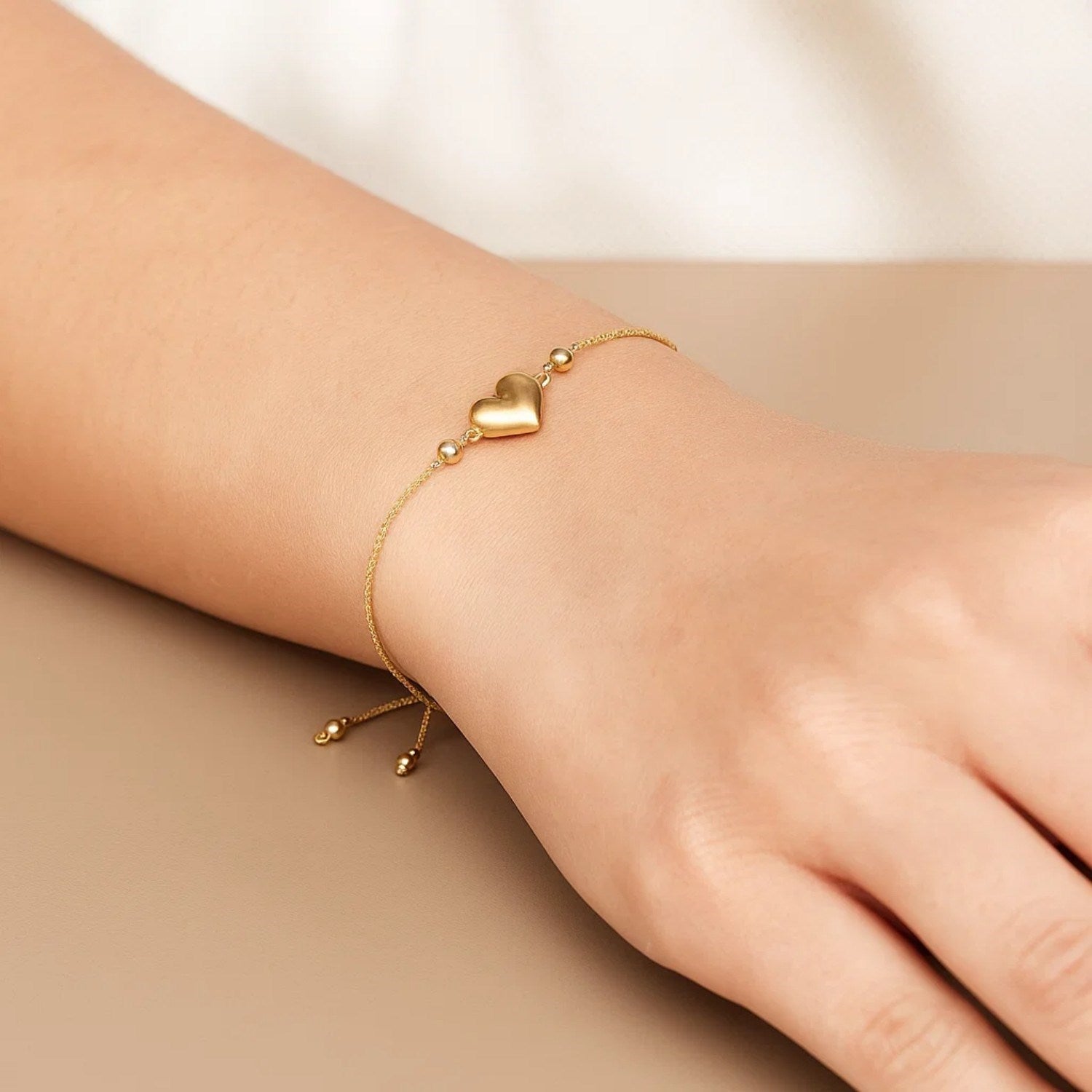 Adjustable Puffed Heart Draw String Bracelet in 14K Yellow Gold