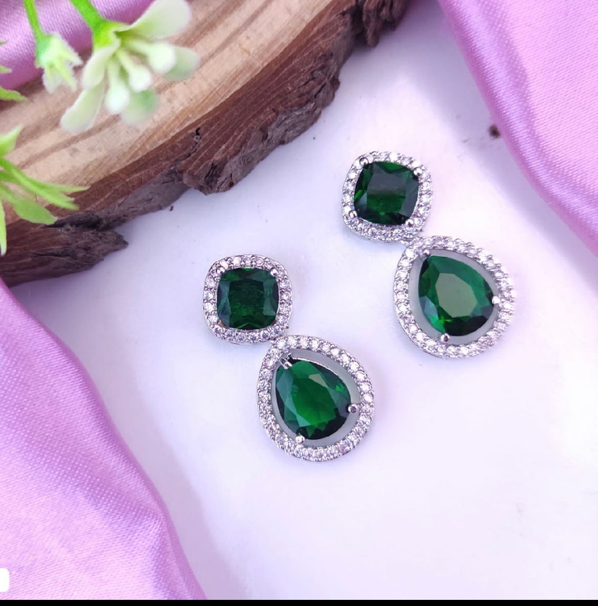 AD earrings: green