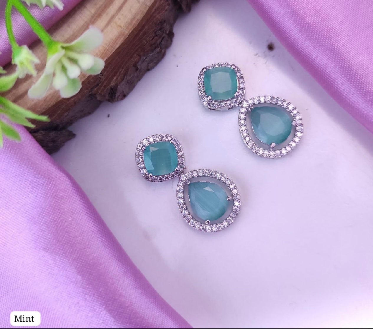 AD earrings: Sea green