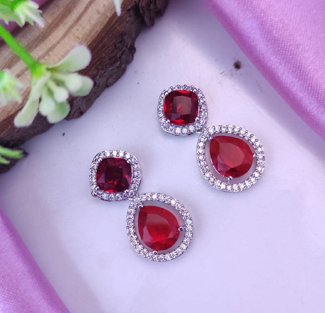 AD earrings: red
