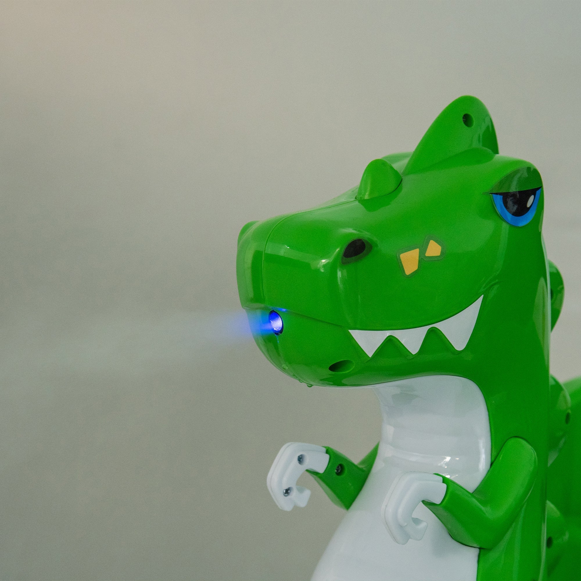 12V Kids Ride On Bumper Car W/Parents Control,Dinosaur Shape & Element Design,2WD,Spray With Light,360 Degree Rotation,Safety Anti-Collision Strip,Switchable music,Large Size Seat Design For Kids 2-5.