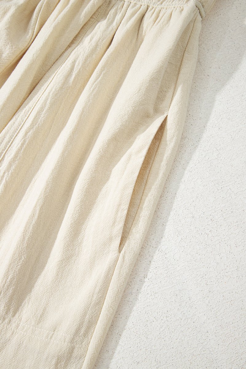 Beige Sleeveless Wide Leg Jumpsuit with Ruched High Waist Design